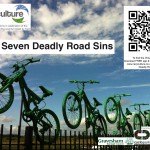 7 green bikes leap from a fence, QR code links to www.recyculture.co.uk Search for 'Seven Deadly...'